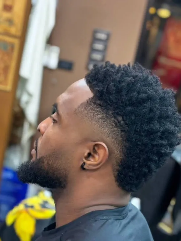 Afro sponge twists with a drop fade
