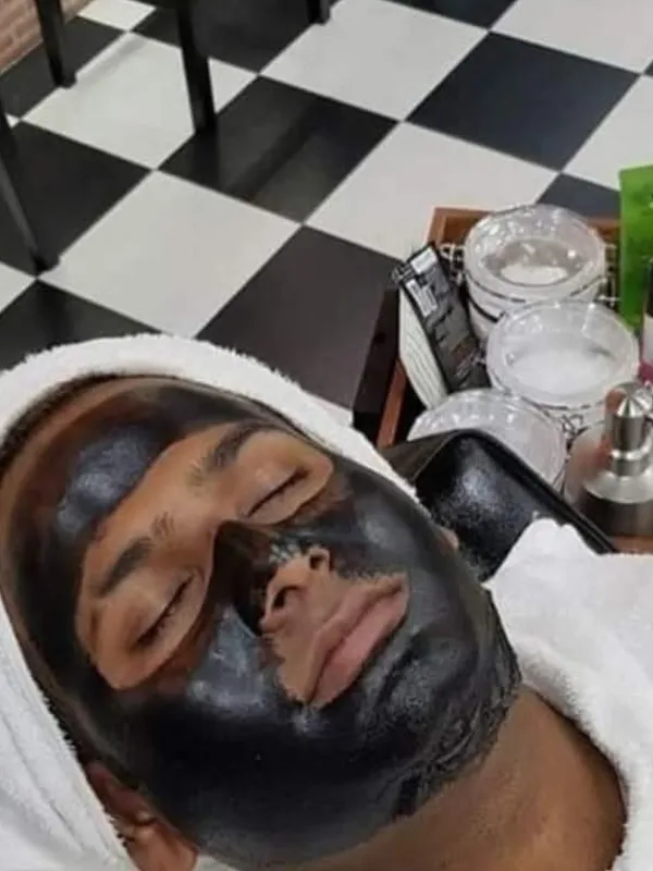 Black mask facial treatment