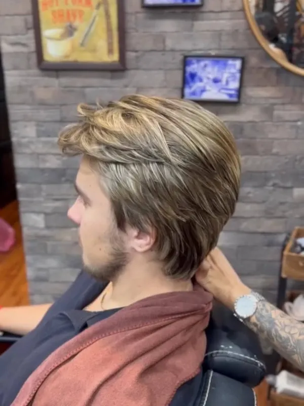 Long blonde balayage with a natural root