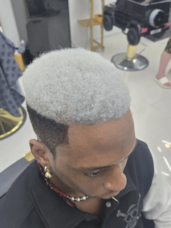 Silver grey colour on a high top fade