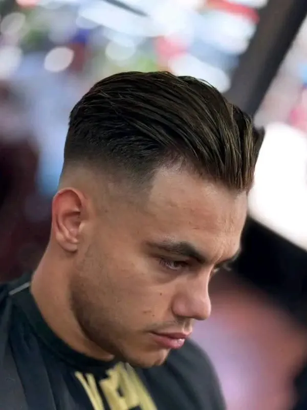 Slick back with a high skin fade