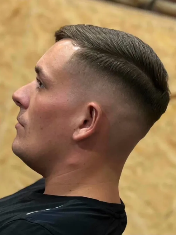 Side part with a mid fade