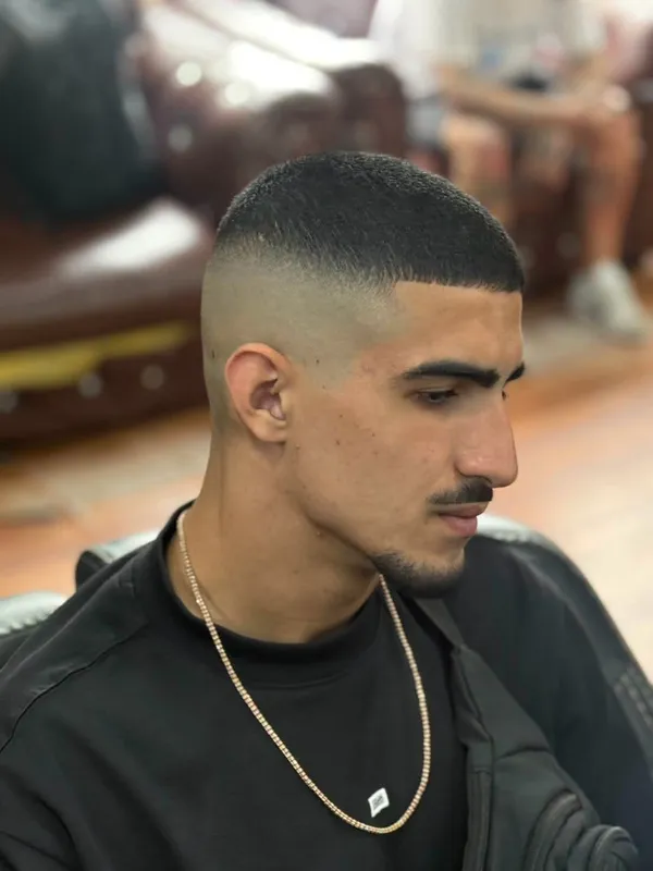 Short skin fade with a sharp line up