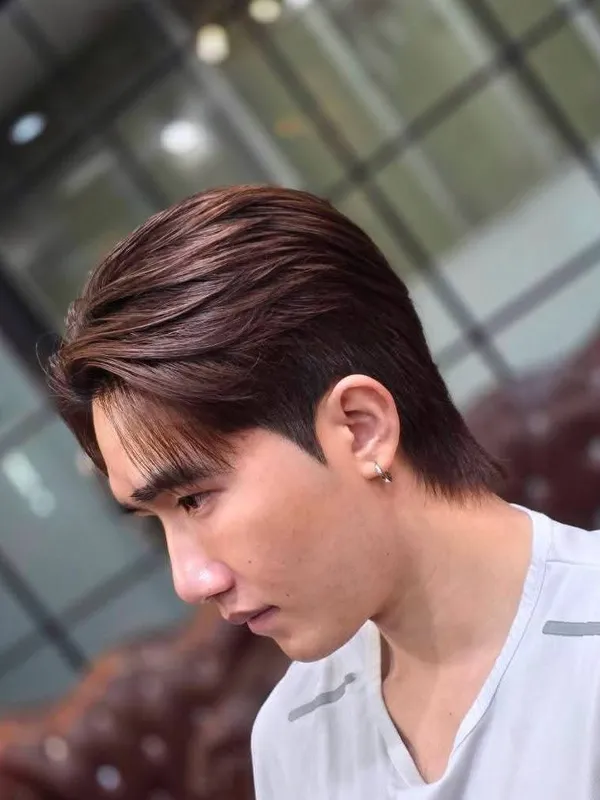 Mid length layered cut in copper brown