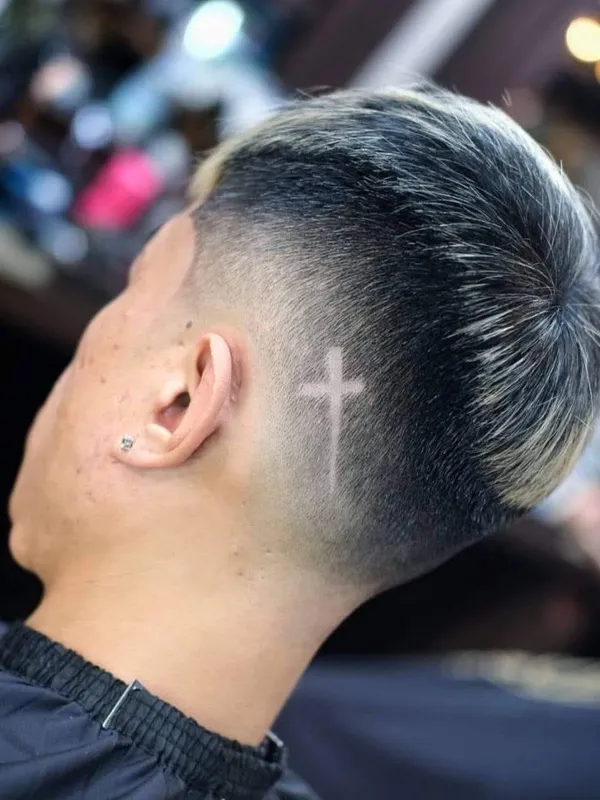 Cross design behind the ear